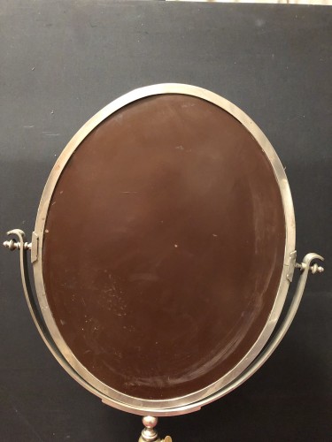 Ancien miroir de magasin de chapelier.