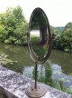 Ancien miroir de magasin Siegel en bronze