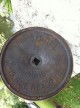 Ancien miroir de magasin Siegel en bronze