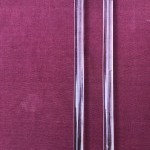 Deux anciennes paires de poignées de porte d'un magasin de luxe