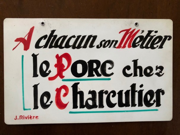 Panonceau publicitaire ancien.