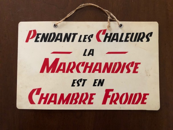 Panonceau publicitaire ancien.