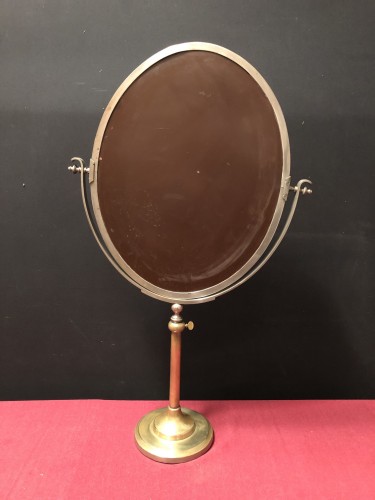 Ancien miroir de magasin de chapelier.