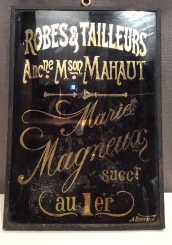 Ancienne plaque de métier.