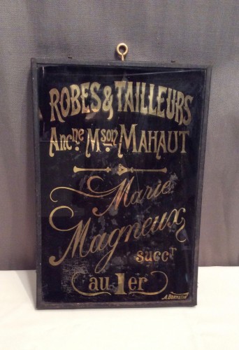 Ancienne plaque de métier.