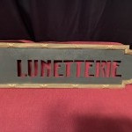 Ancienne enseigne intérieure.