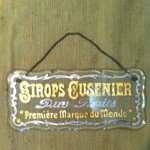 Ancienne plaque publicitaire en verre