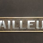 Ancienne enseigne de tailleur.