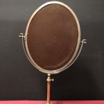 Ancien miroir de magasin de chapelier.