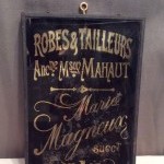 Ancienne plaque de métier.